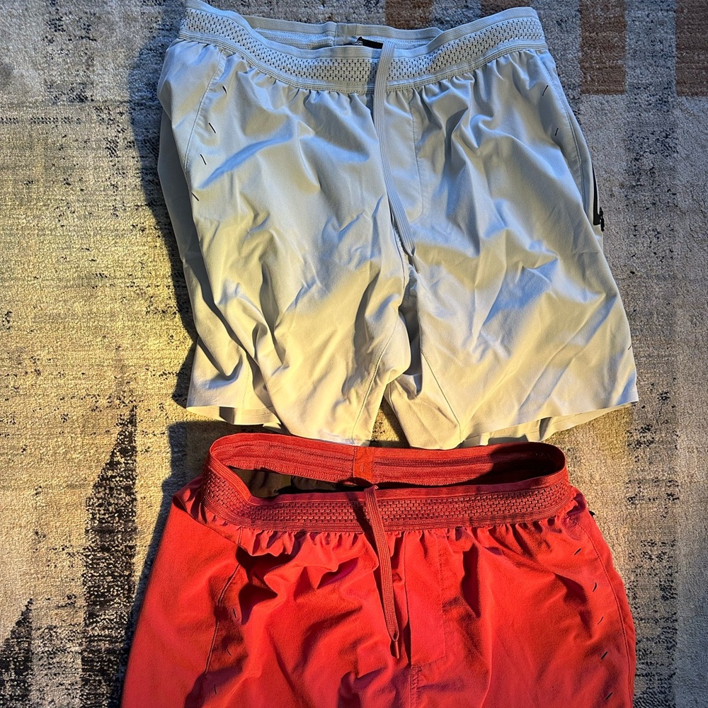 Ten Thousand Session Short. Used Good Condition. Medium. Length 7”. Red and Grey